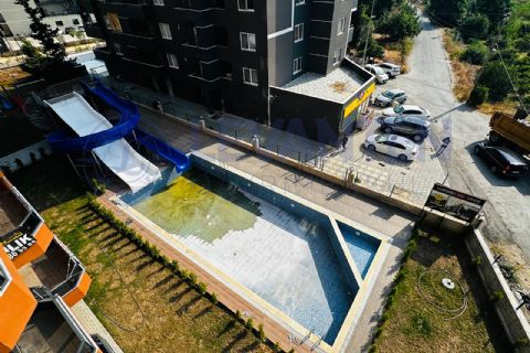 LEVANTENDEN TÖMÜKTE DENİZE YÜRÜME MESAFESİNDE AQUA HAVUZLU 2+1